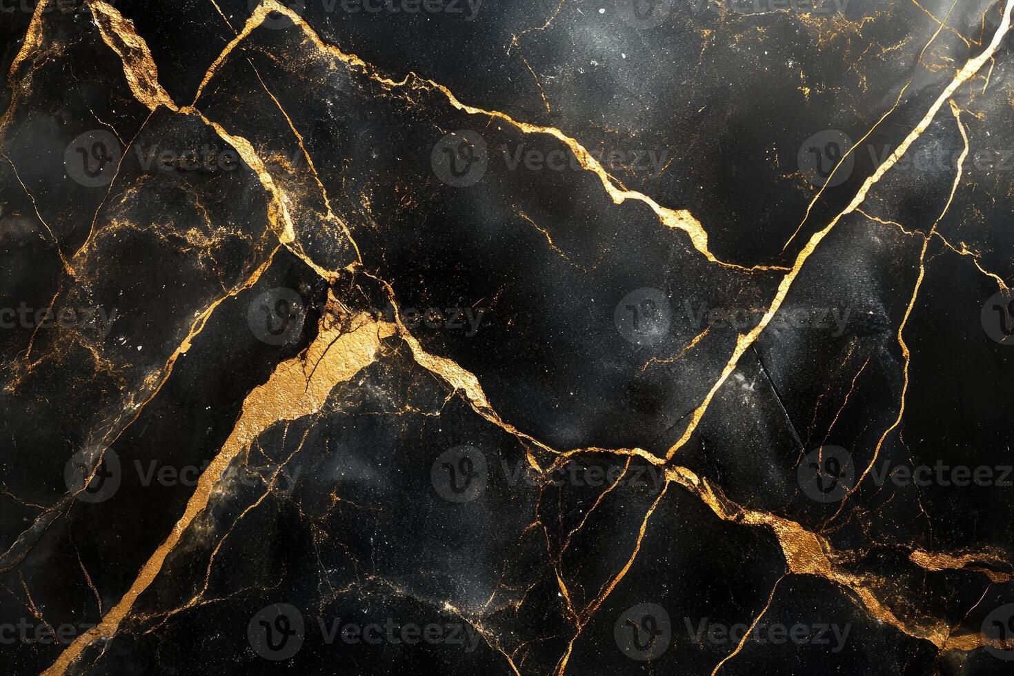 Black marble with golden veins creating luxurious texture . . photo