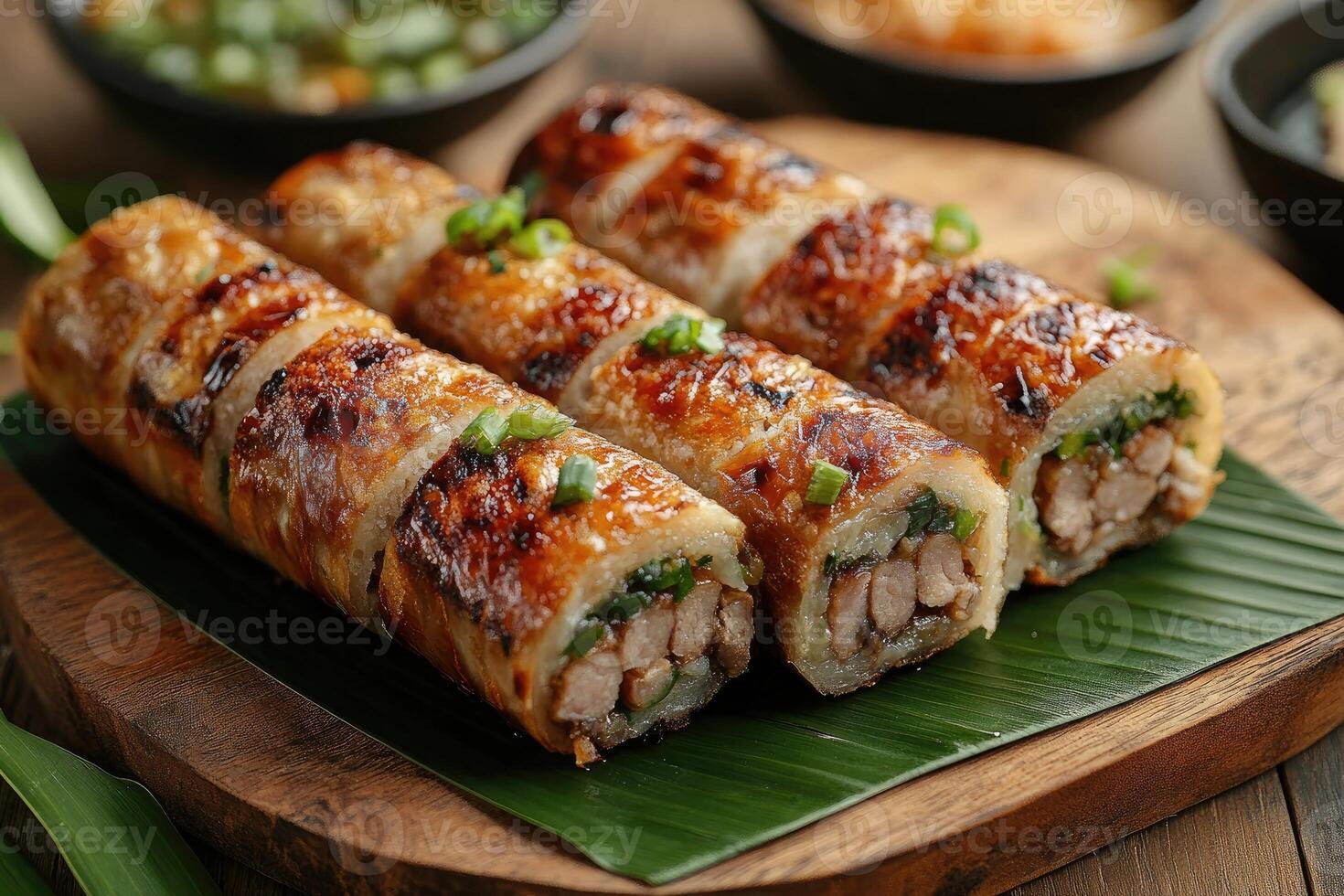 Grilled vietnamese meatball rolls with aromatic herbs and dipping sauce photo
