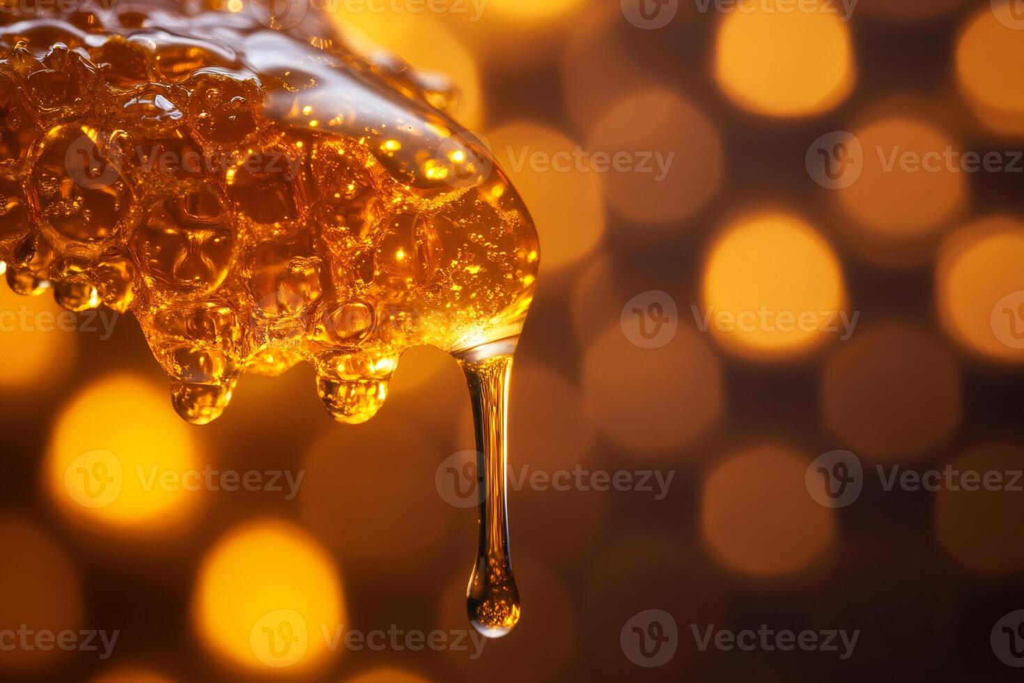 Golden honey dripping with bokeh background illuminating sweetness photo
