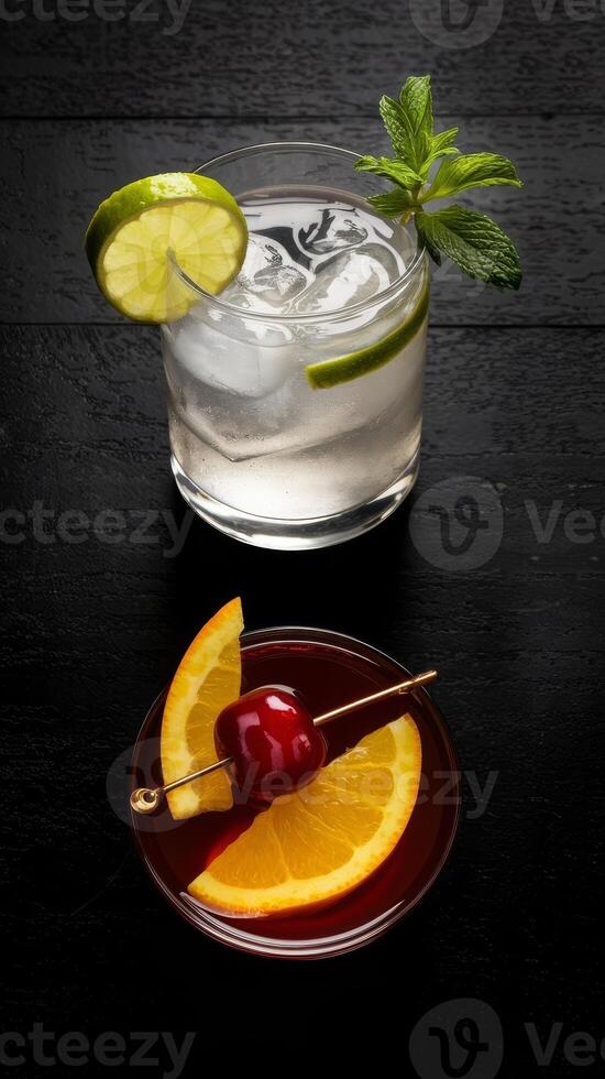 A glass of water with a cherry on top and a slice of orange photo