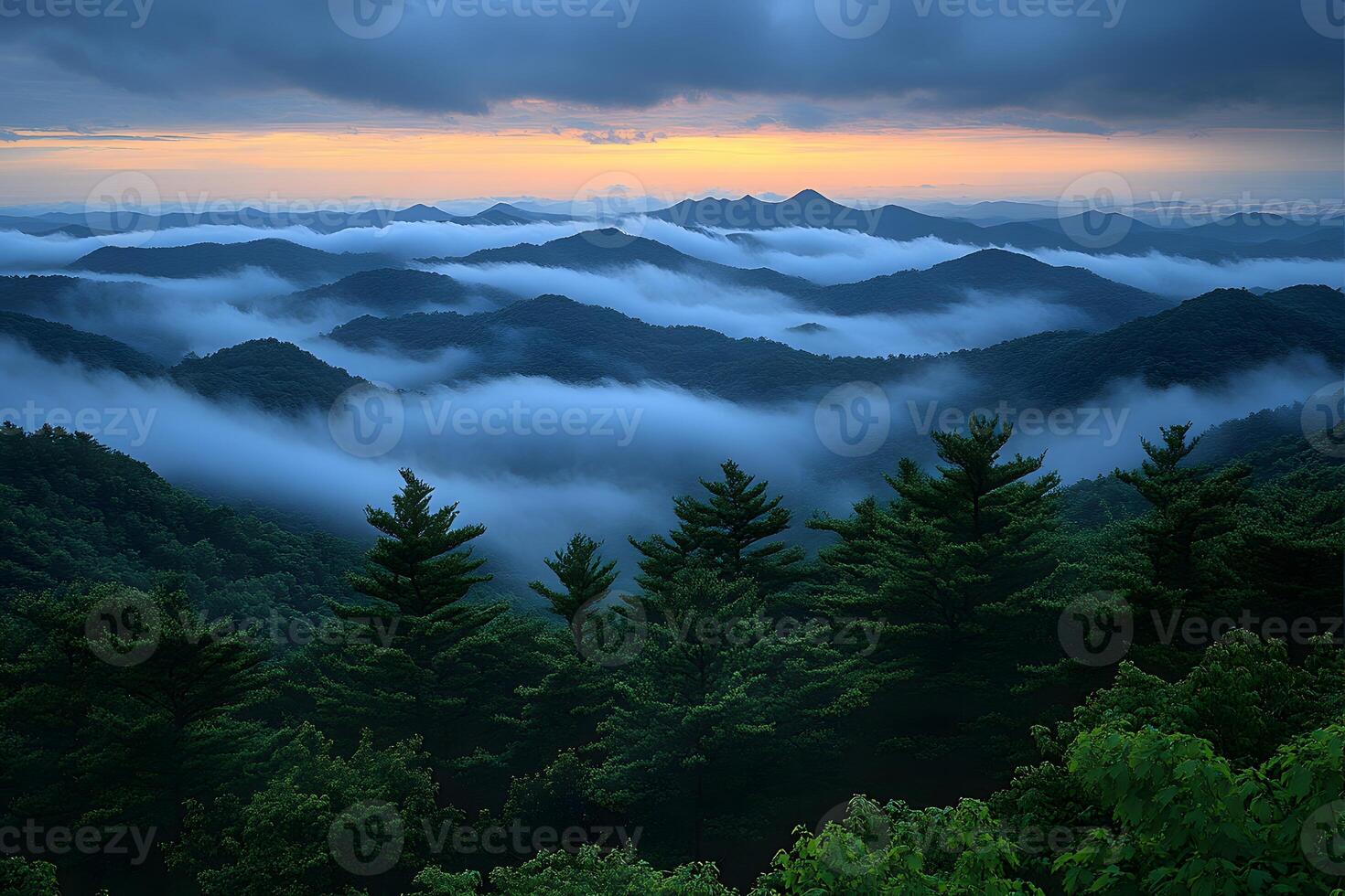 Serene Mountain Range with Misty Valleys at Dawn photo