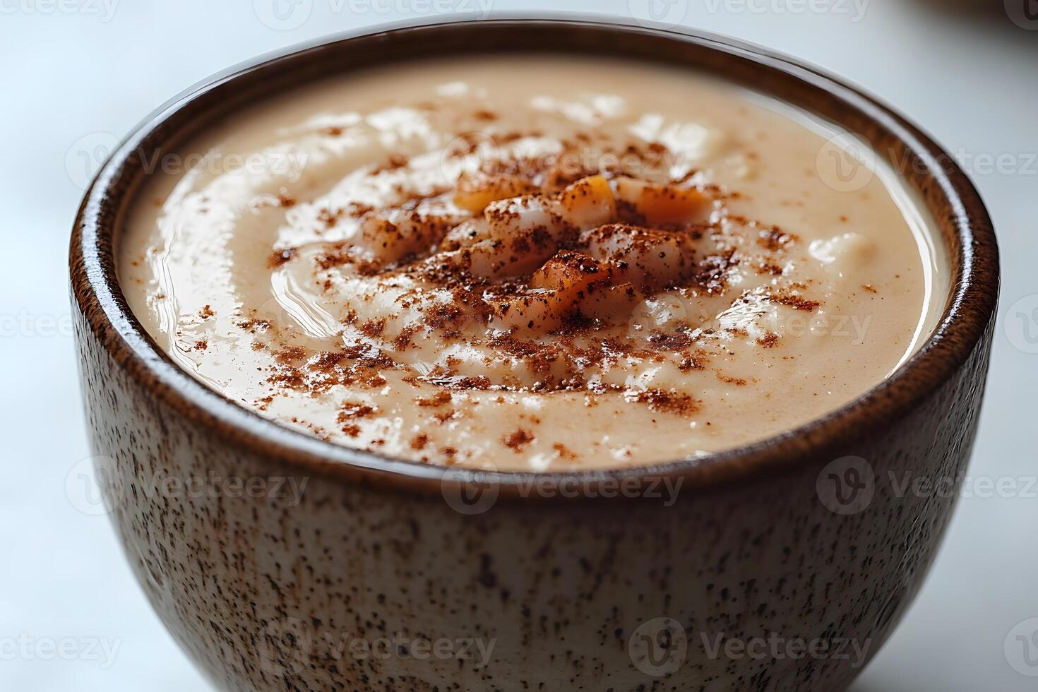 Creamy Rice Pudding with Cinnamon Topping for Dessert Delight photo