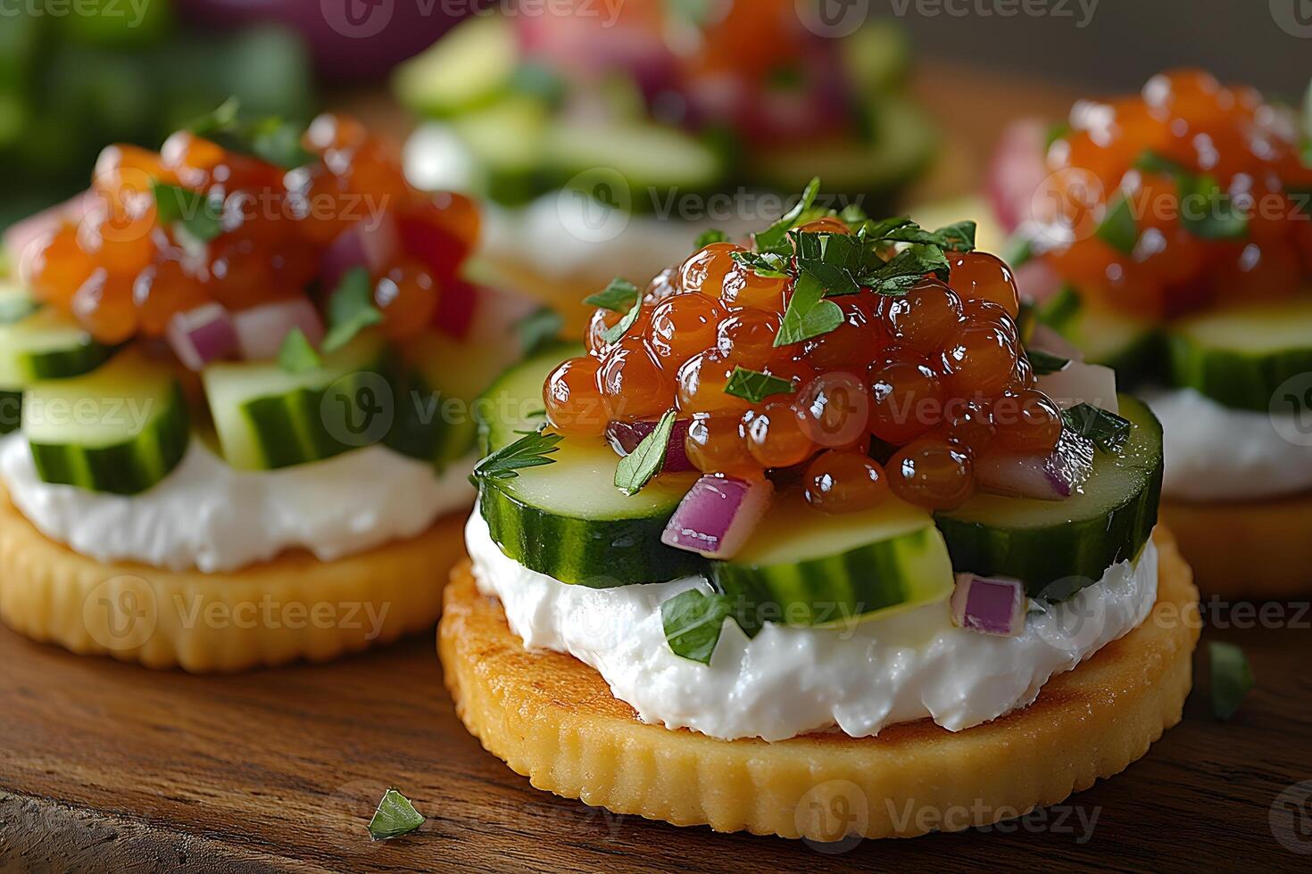 Gourmet Appetizer Creamy Cucumber and Salmon Roe Canap s on Crispy Crackers photo
