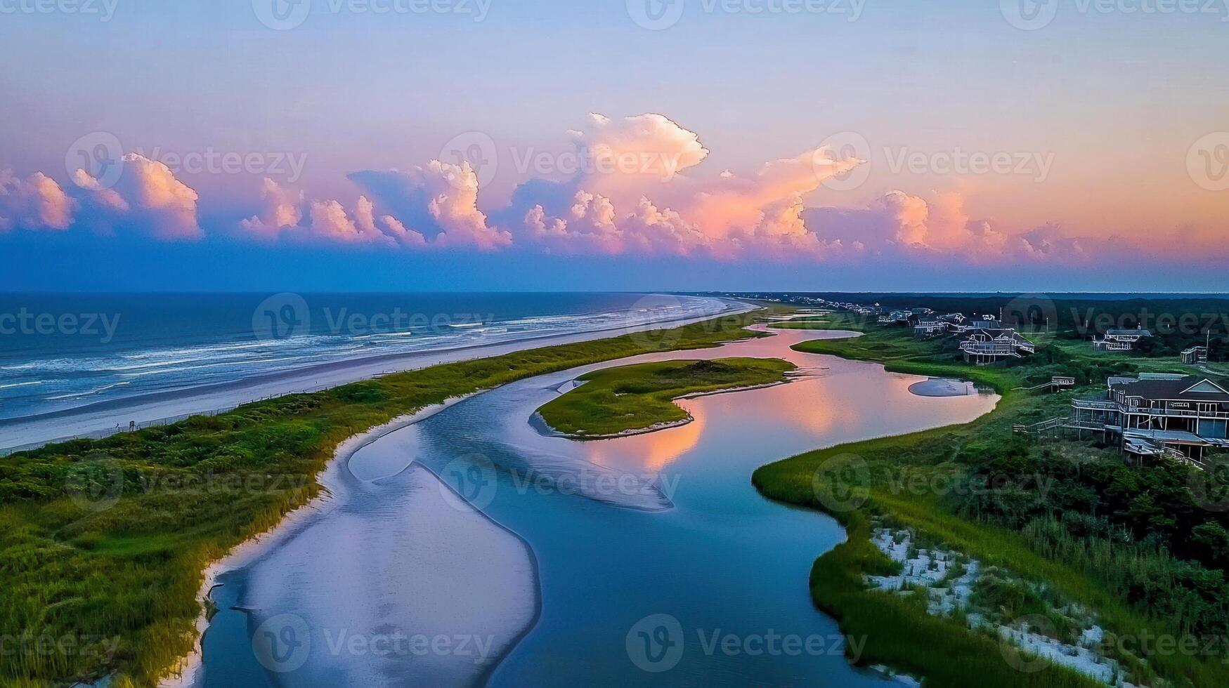 Serene Coastal Sunset Scenic Aerial View of Ocean Beach Inlet and Houses photo