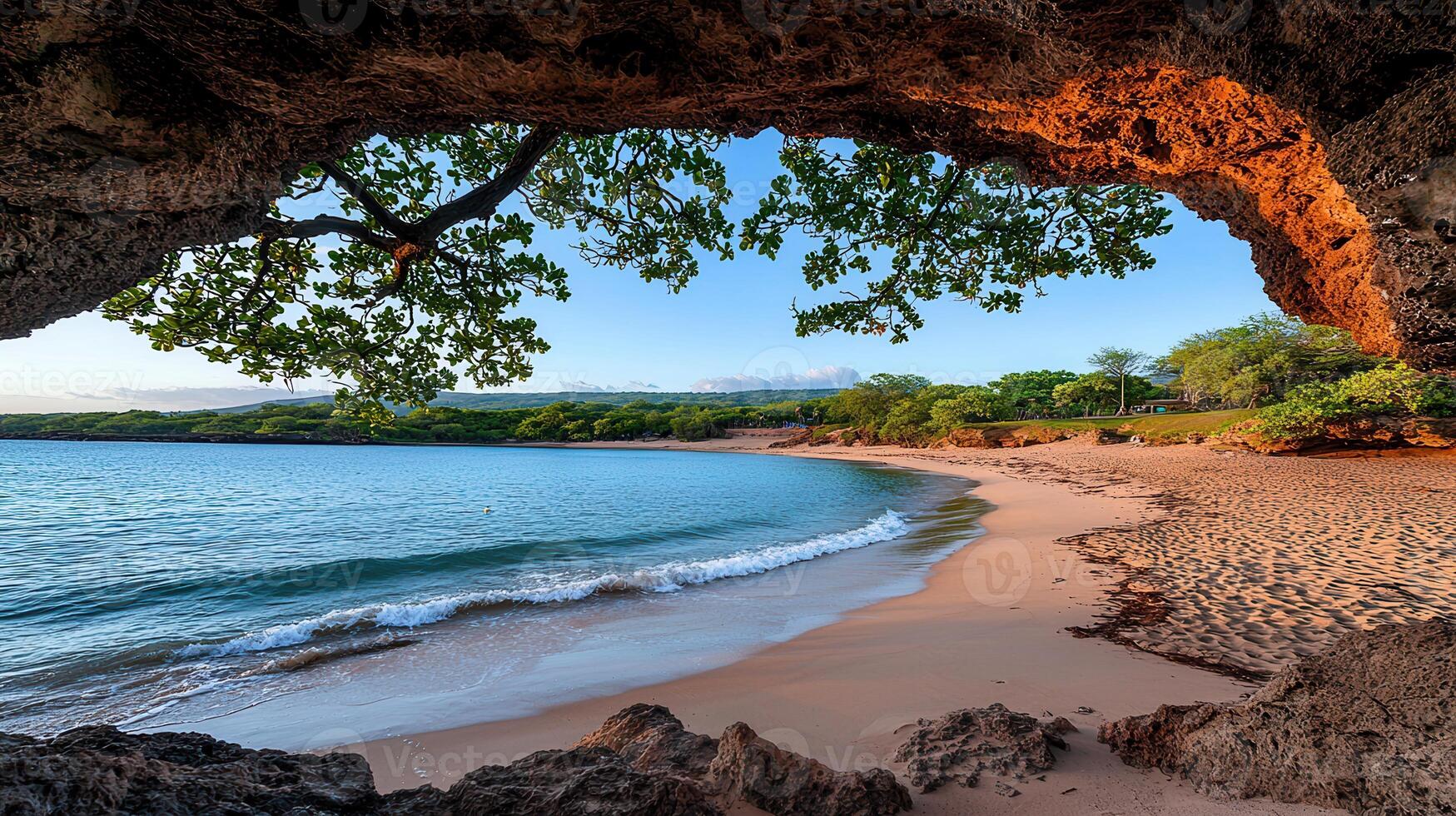 Serene Beach Cove Viewed from Rocky Overhang Tranquil Ocean Scene Peaceful Tropical Paradise Idyllic Coastal Landscape photo
