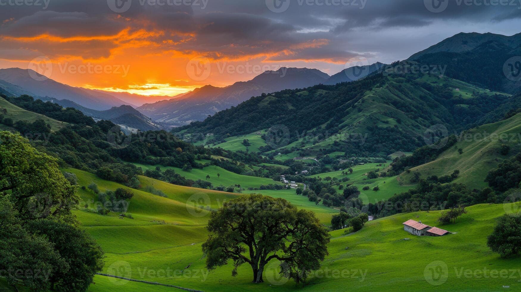Serene Sunset over Rolling Green Hills and Mountains Dramatic Landscape photo