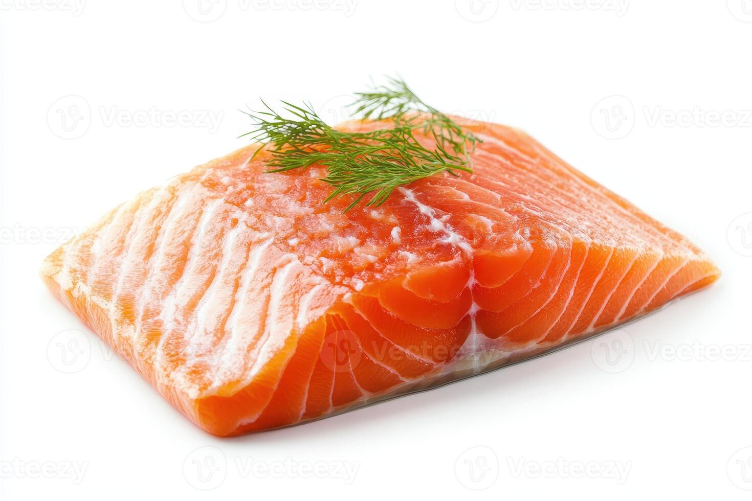 A fresh salmon fillet garnished with a sprig of dill, ready for cooking or presentation. photo
