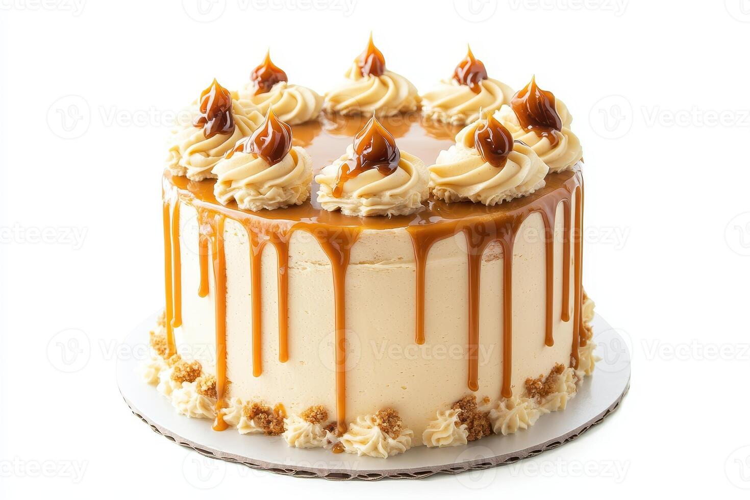A delicious caramel cake with decorative frosting and caramel drizzle photo