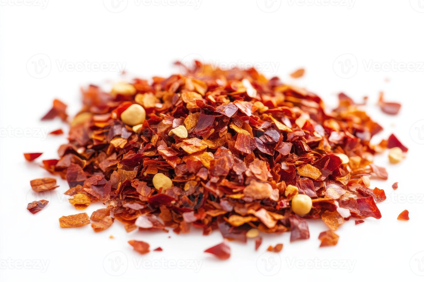 A pile of crushed red chili flakes, commonly used as a spice in cooking. photo