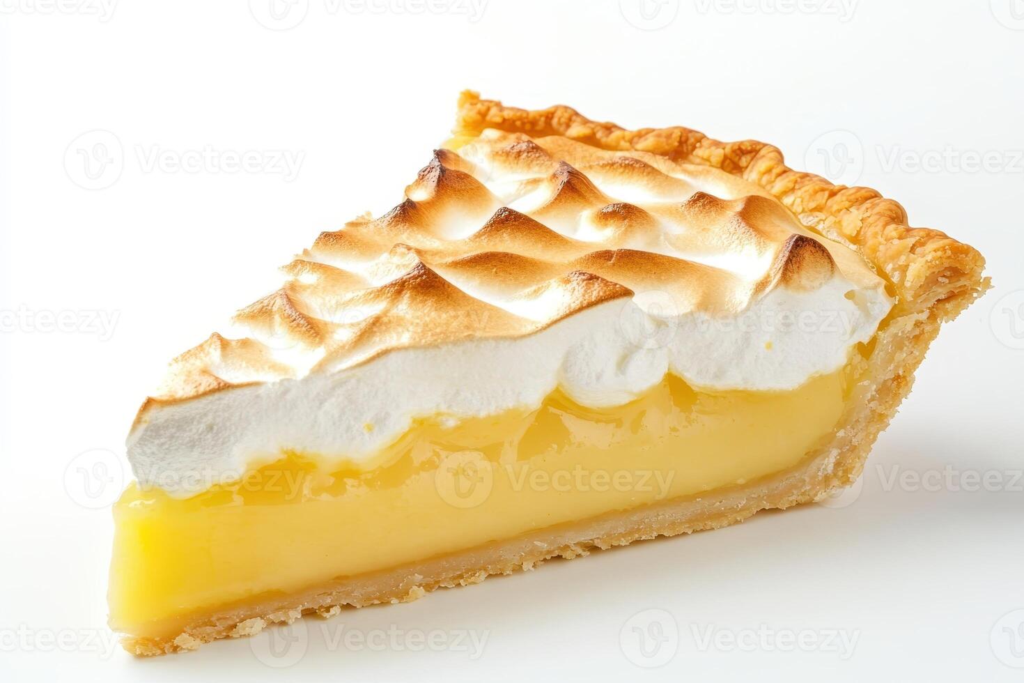 A slice of lemon meringue pie with a golden crust and fluffy meringue topping. photo