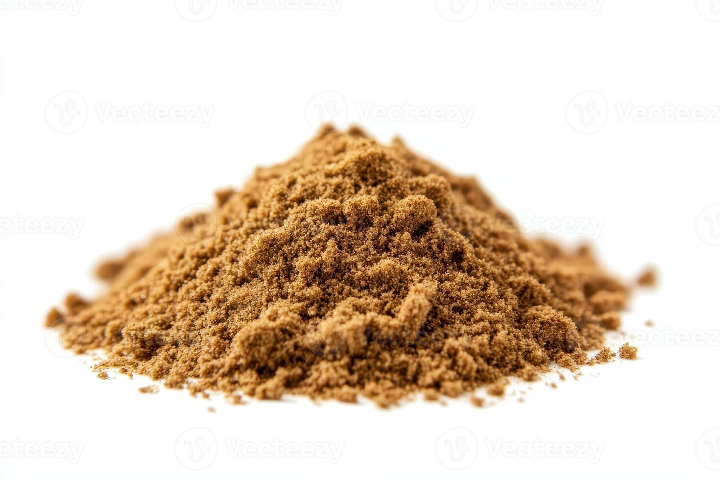A pile of brown powder on a white background, possibly a spice or seasoning. photo