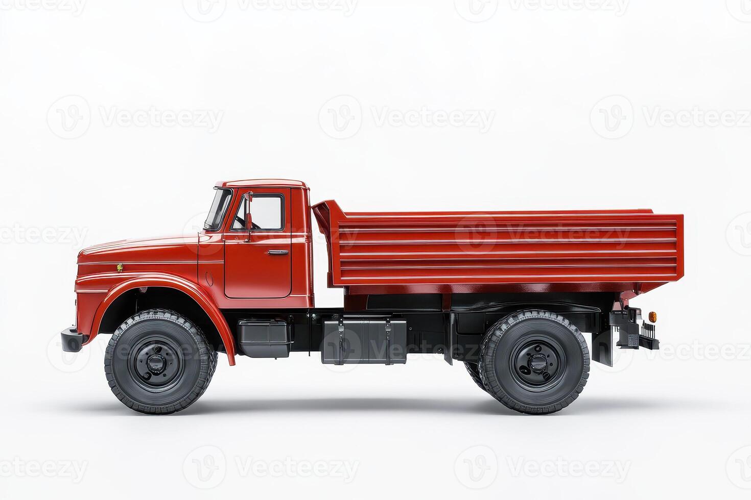 A red dump truck with a flatbed, designed for transporting materials. photo