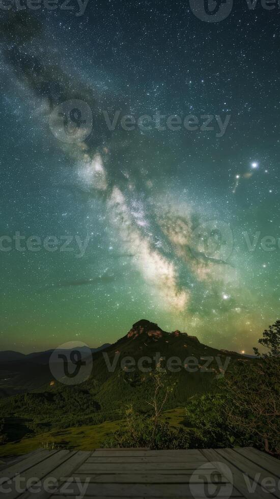 The milky way over the mountains photo