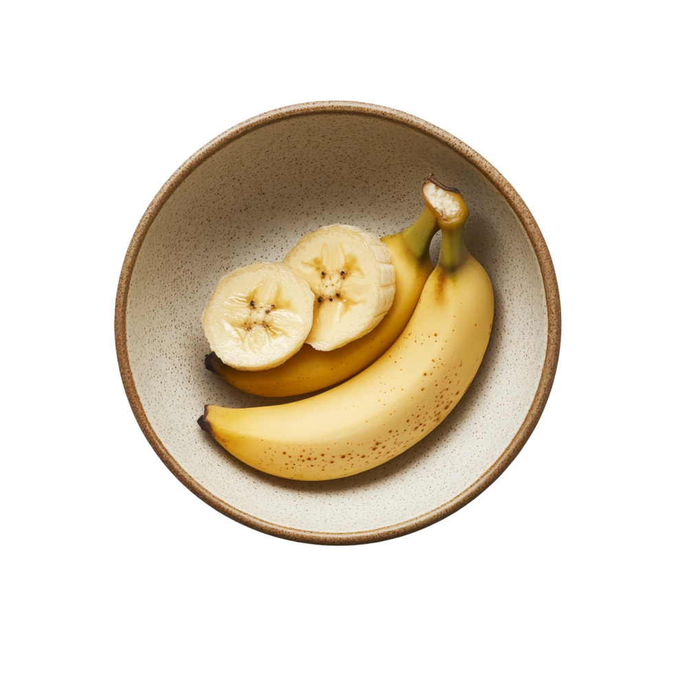Freshly sliced banana resting in a simple bowl on a clean transparent background for healthy eating, slice banana in bowl on transparent background png