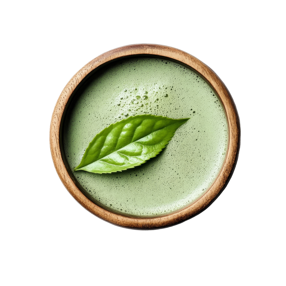 Enjoying instant matcha green tea in a wooden bowl garnished with a fresh leaf, perfect for a calming moment, instant matcha green tea in wood bowl with leaf on transparent background png