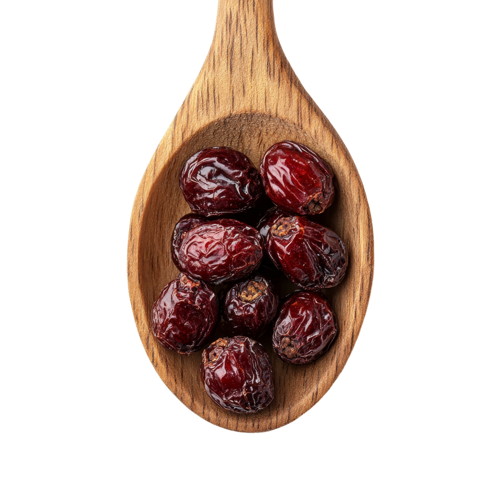 Dried jujube fruit in a wooden spoon on a transparent background, showcasing its natural color and texture, Jujube Chinese dried in wood spoon on transparent background png
