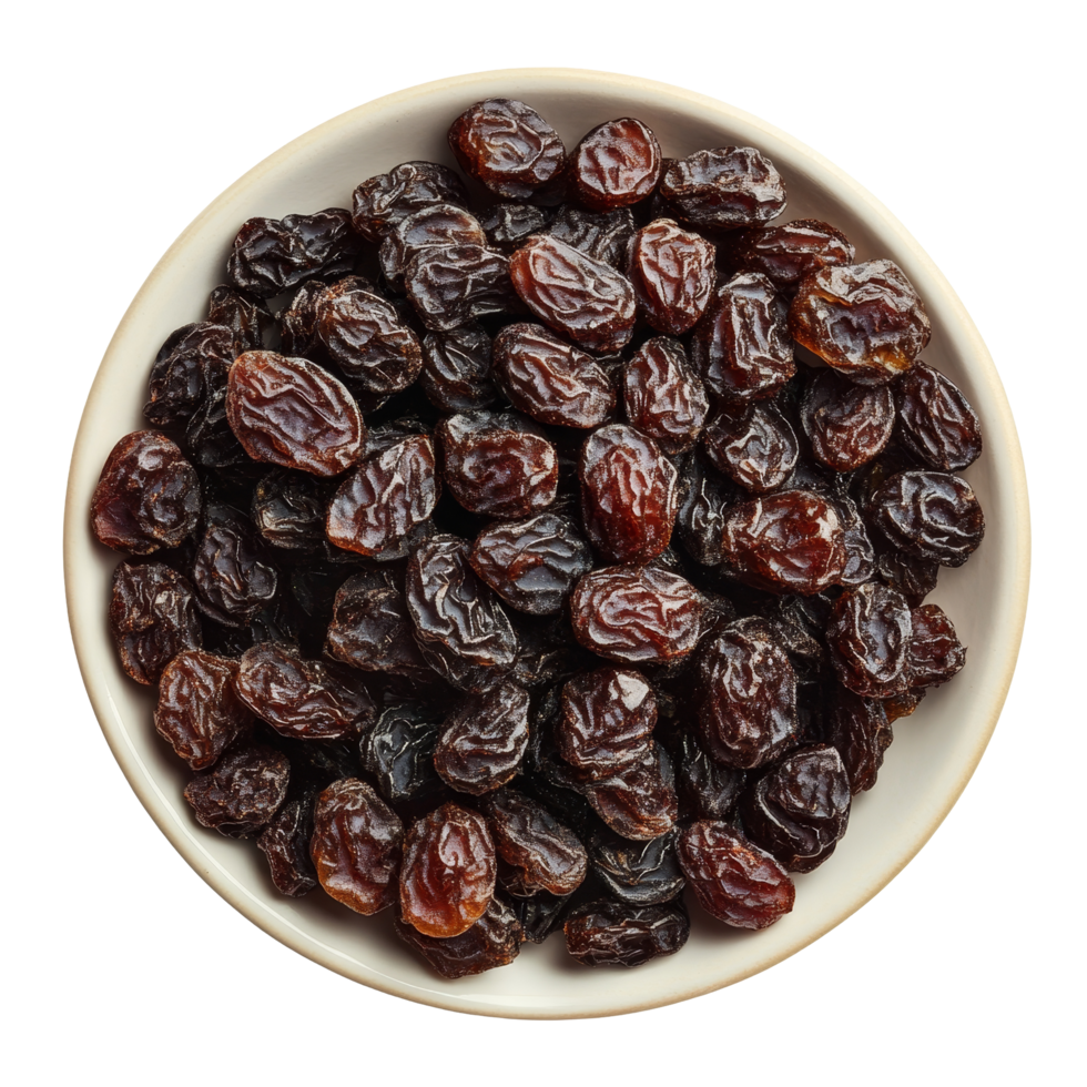 Dried raisins piled in a round plate on a clean transparent background showcasing their rich texture and color, Dried raisins in a plate isolated on transparent background png