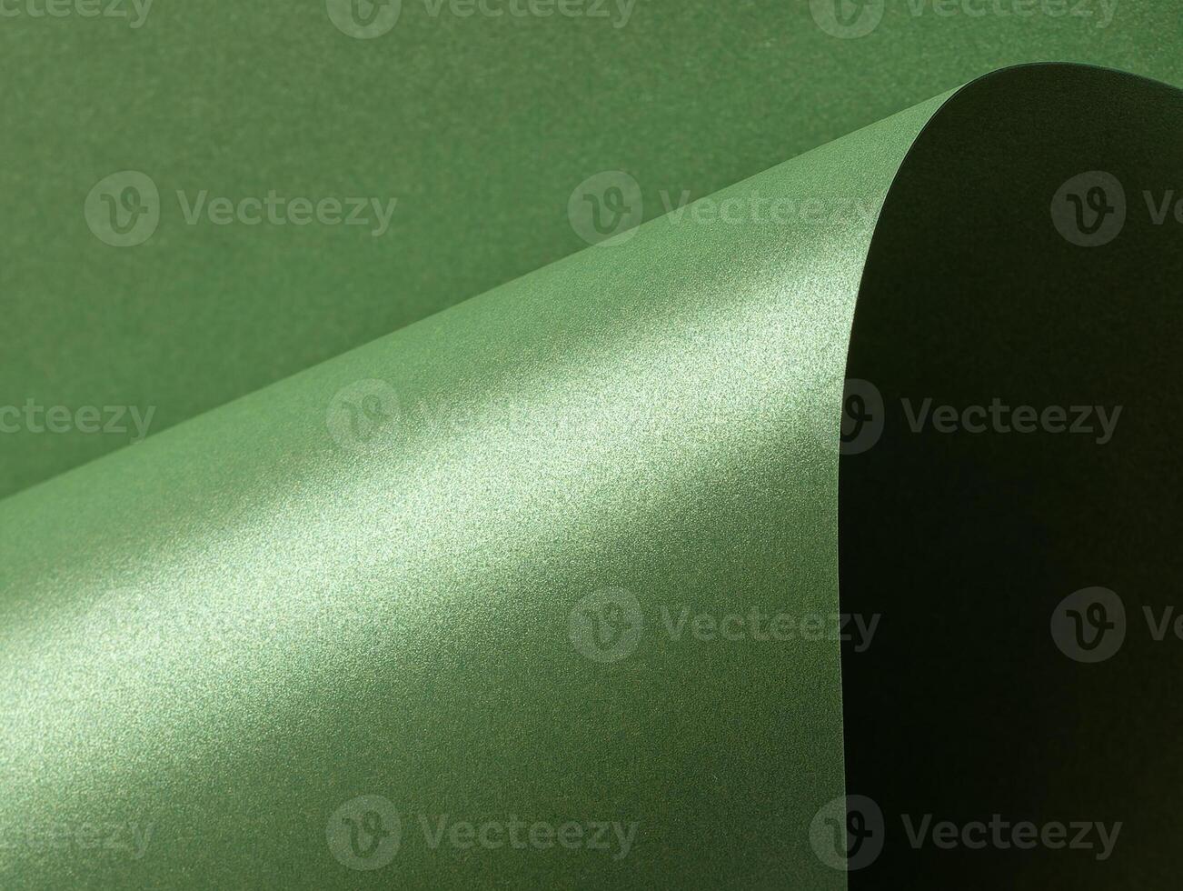 Deep forest green paper background with a smooth matte texture and subtle wavy edges. Rich basil and photo
