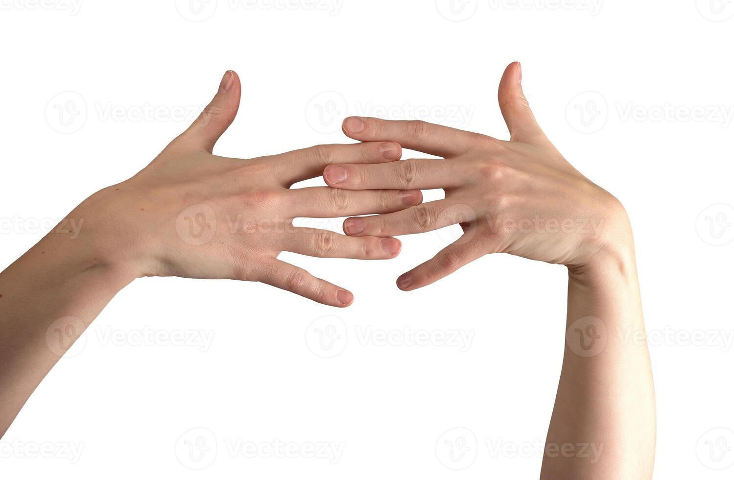 Female hands elegantly intertwined, showcasing well-groomed, glossy nails and smooth skin. photo