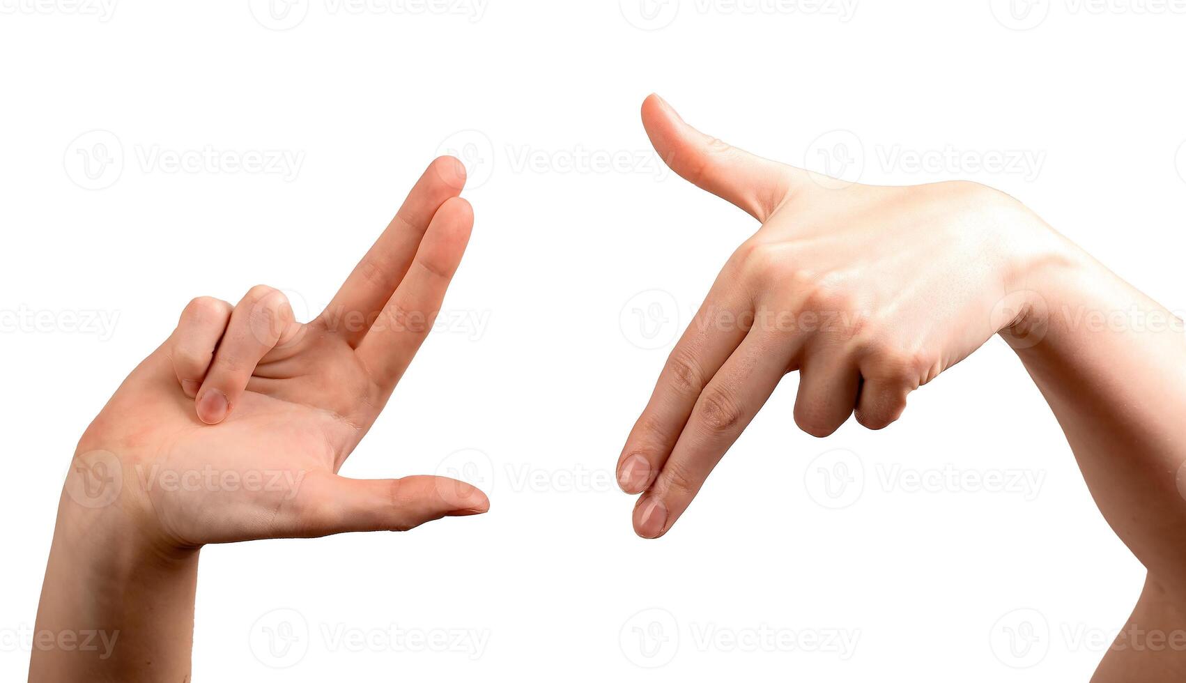 Female hands forming an L-shaped frame, fingers positioned to visualize a scene, shot, or photo
