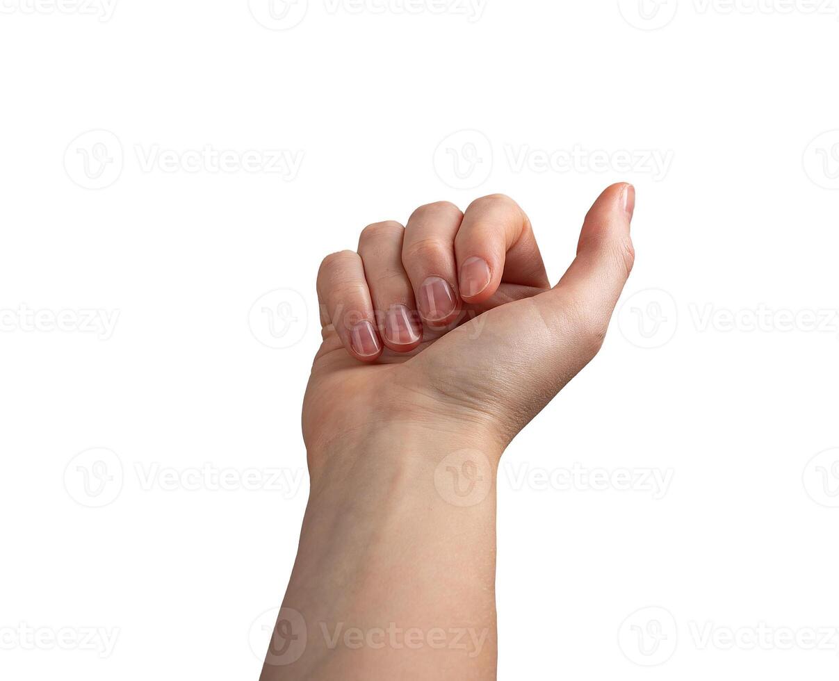 Female hand with neatly manicured nails, fingers slightly curled in a subtle beckoning or grasping photo