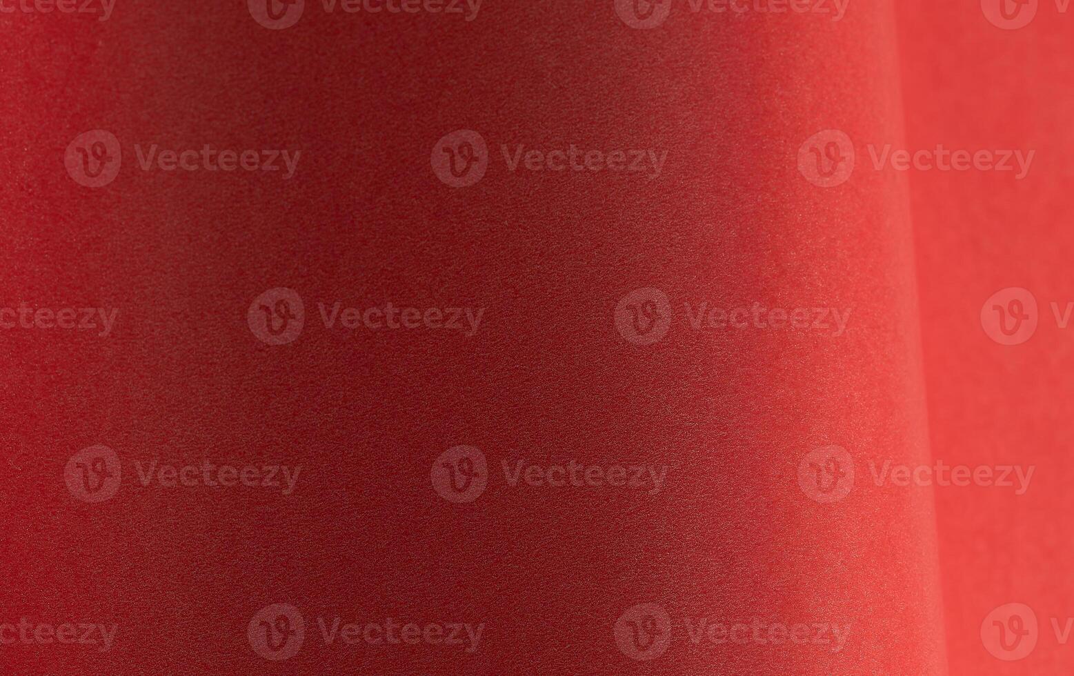 Deep carmine paper background with a velvety matte texture and subtle gradient. Rich scarlet and photo