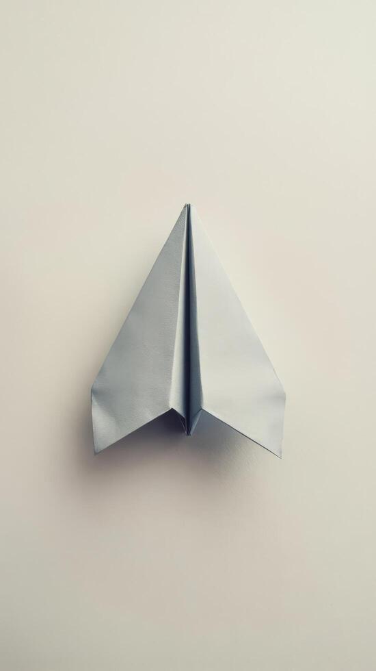 Paper plane origami isolated on a white background photo