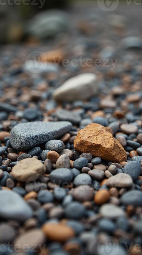 Stunning Phone Wallpaper of Colorful Pebbles on a Tranquil Ground Surface photo