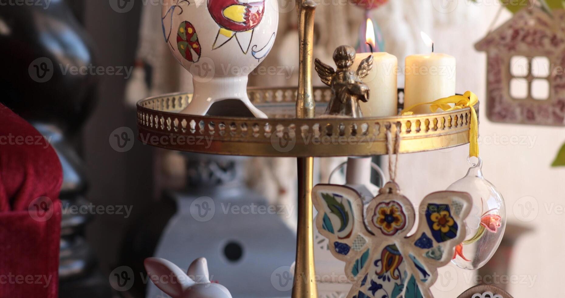 Creative Easter tiered tray decorations featuring handcrafted items, candles, and colorful ornaments for a festive spring display that enhances any Easter celebration atmosphere in the home photo