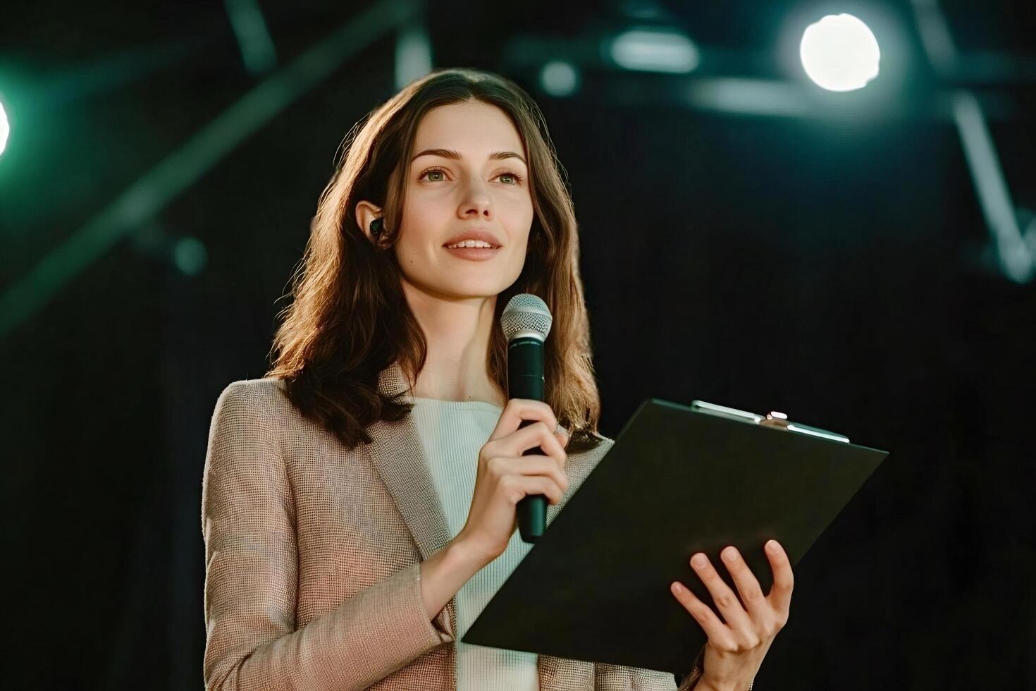 Motivational speaker inspiring audience with her speech during conference photo