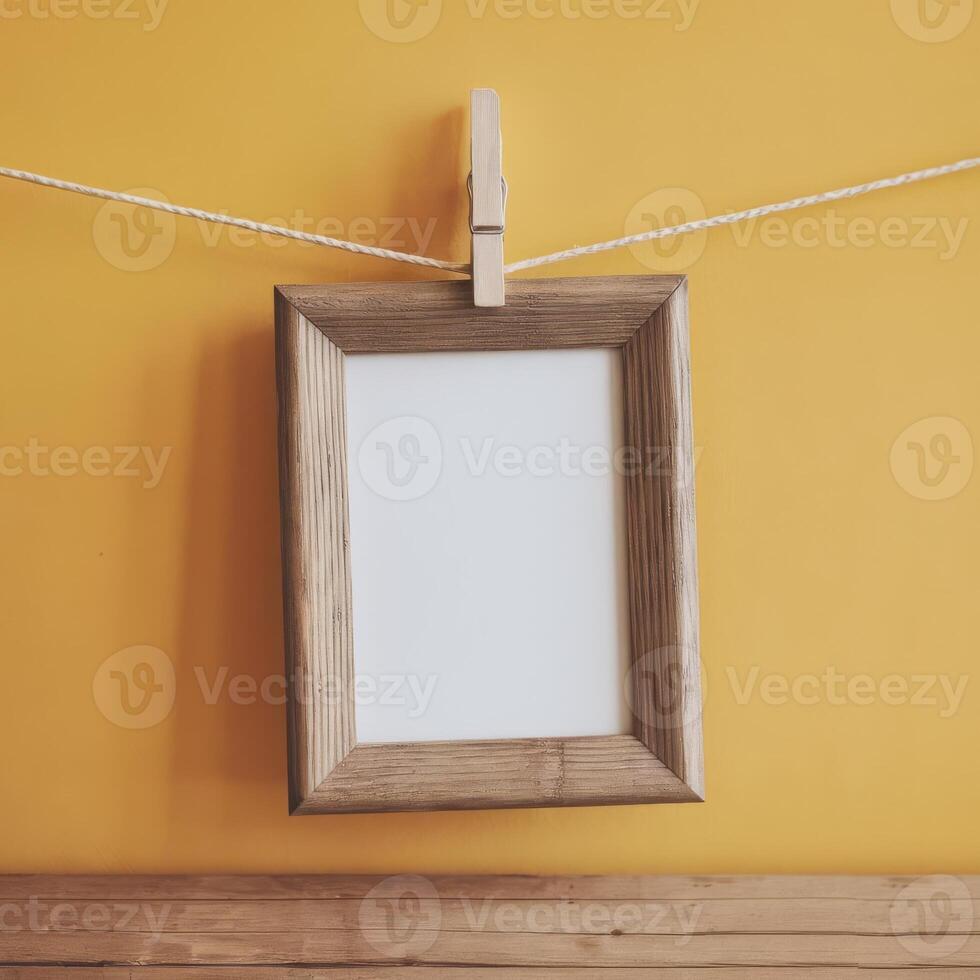 Photo frame hanging on clothesline