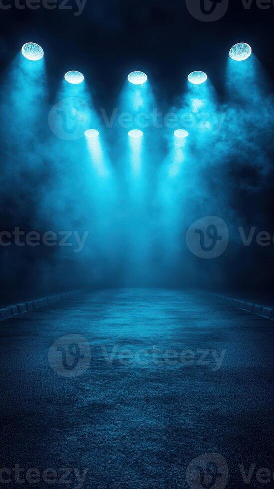 Dance floor illuminated by blue stage lights creating a vibrant atmosphere for performers photo