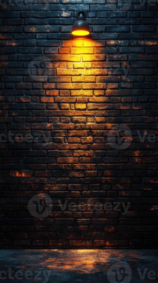 Lighting illuminates textured brick wall in urban setting during evening hours for a dramatic atmosphere photo