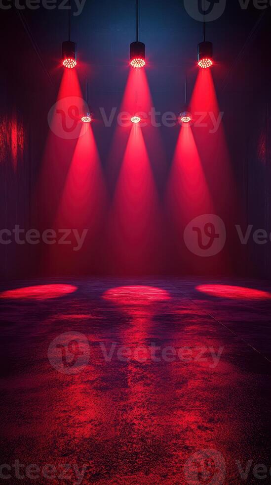 Red spotlight illumination creates a dramatic atmosphere in an empty performance space photo
