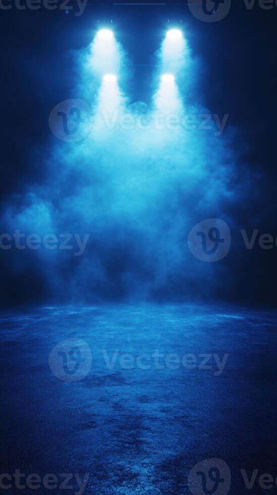 Moody stage lighting creates an atmospheric setting with blue fog illuminating the performance space at night photo
