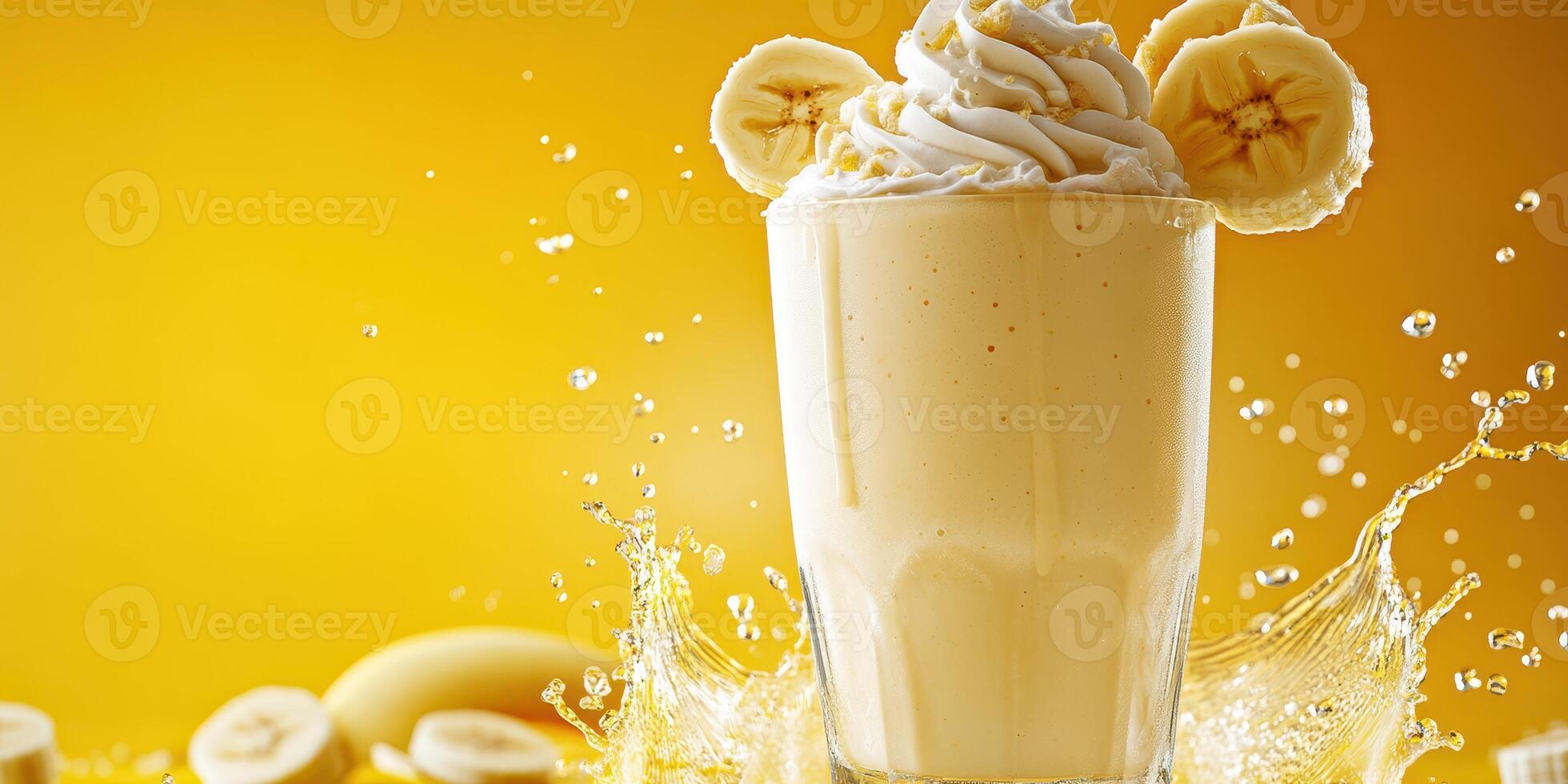 Delicious banana smoothie served with whipped cream, vibrant yellow background enhancing freshness photo
