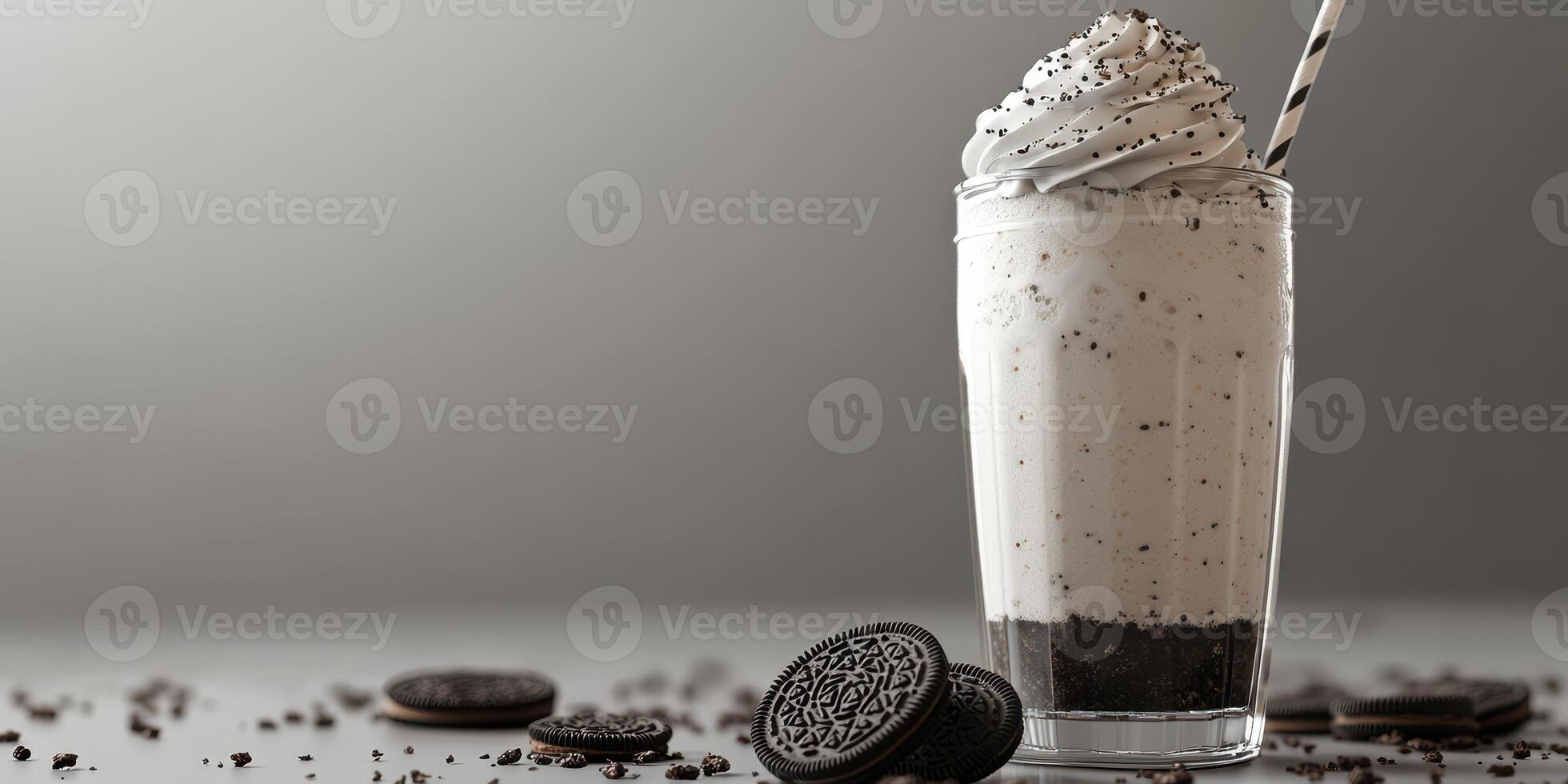 Enjoying a creamy milkshake topped with whipped cream and cookie crumbles in a cozy setting photo