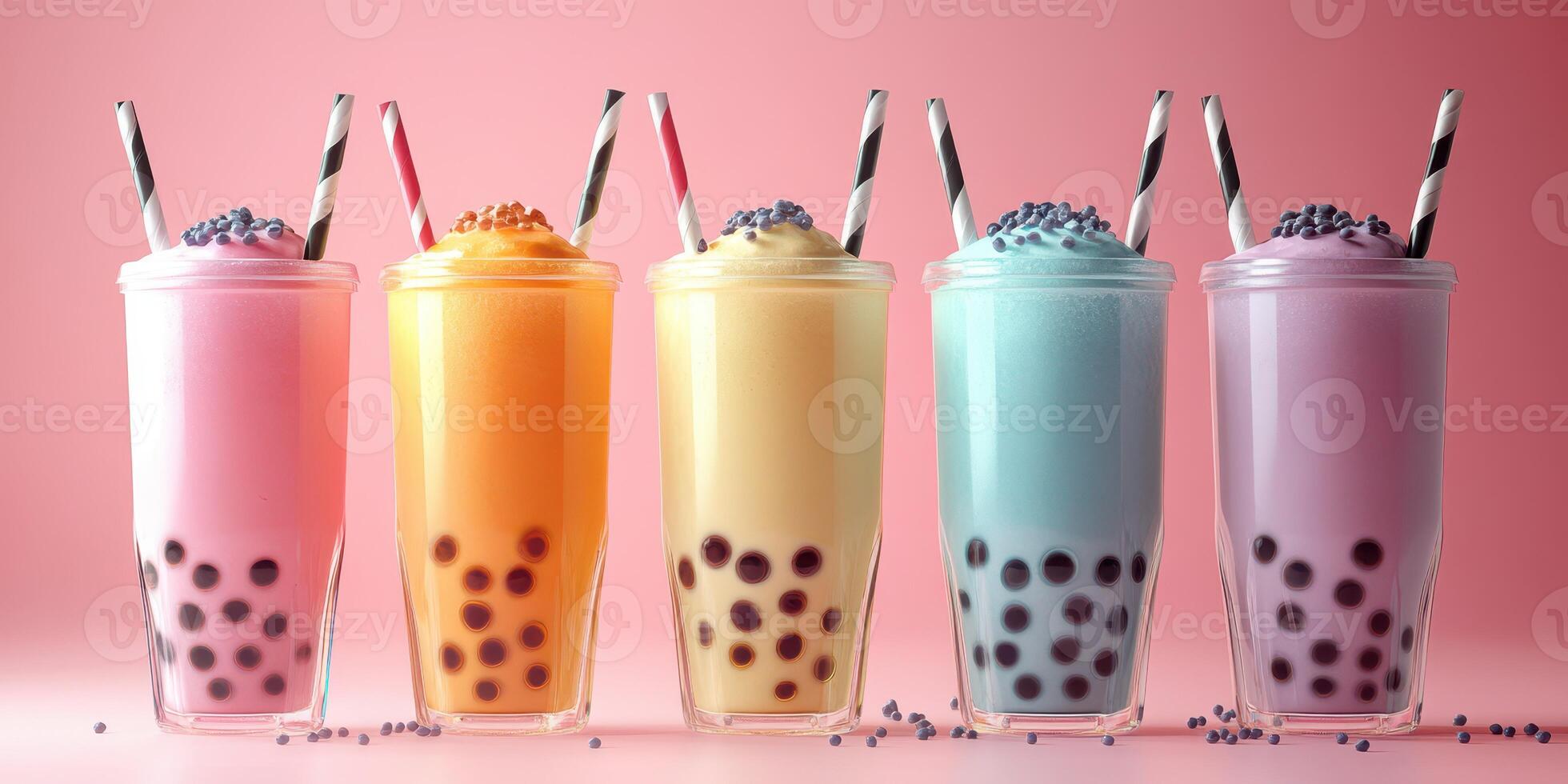 Colorful bubble tea drinks arranged in a stylish display on a pink background for a refreshing treat photo
