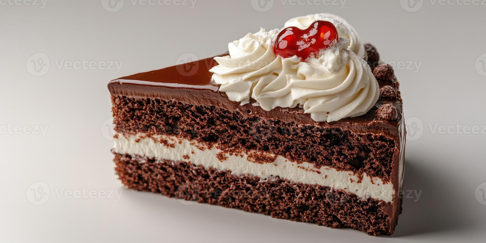 Delicious chocolate cake slice with cream topping and cherry on a grey background photo