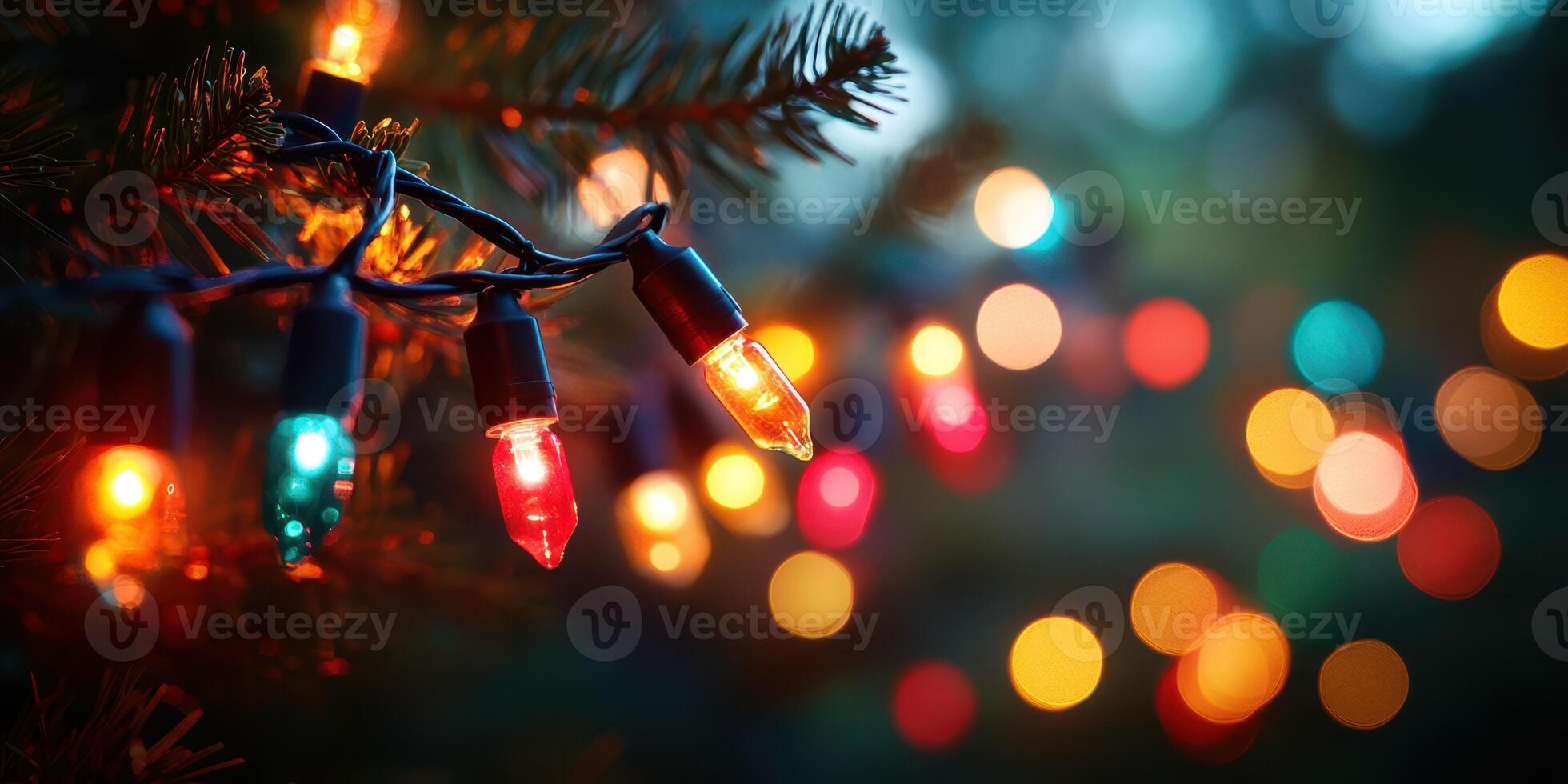 Colorful string lights illuminate a festive atmosphere during the holiday season outdoors near a pine tree photo