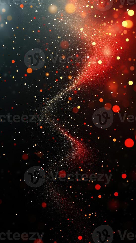 Colorful abstract background with sparkling particles and lights in red and gold tones creating a festive atmosphere photo