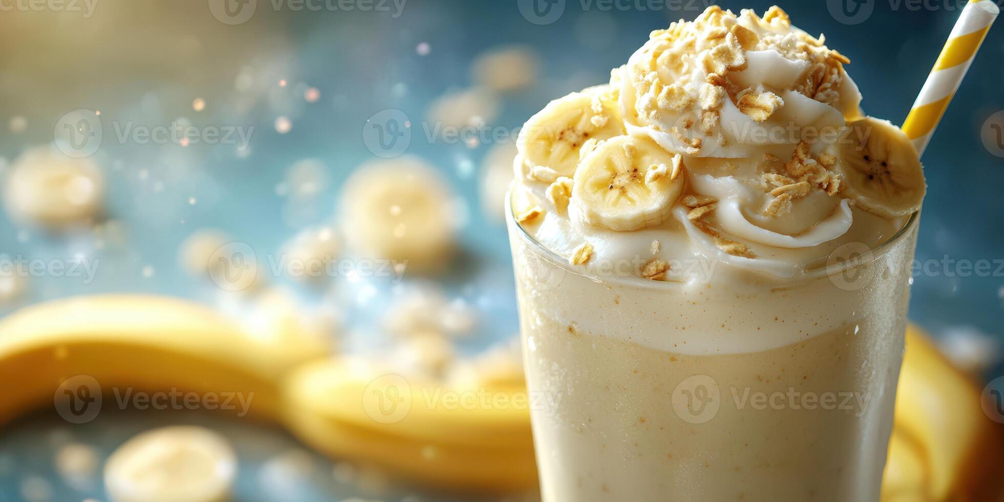 Delicious banana smoothie topped with whipped cream and oats served in a tall glass photo