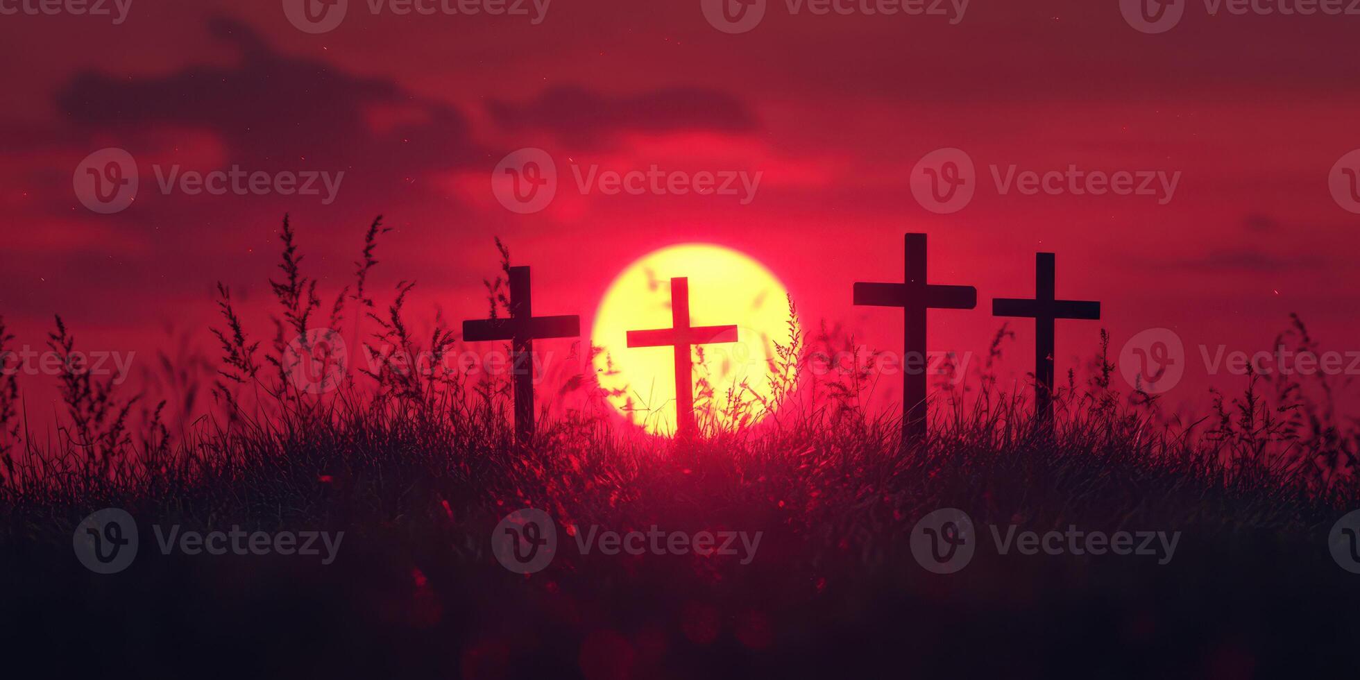 Sunset casts a warm glow on three crosses silhouetted against a vibrant sky in a serene grassy field photo