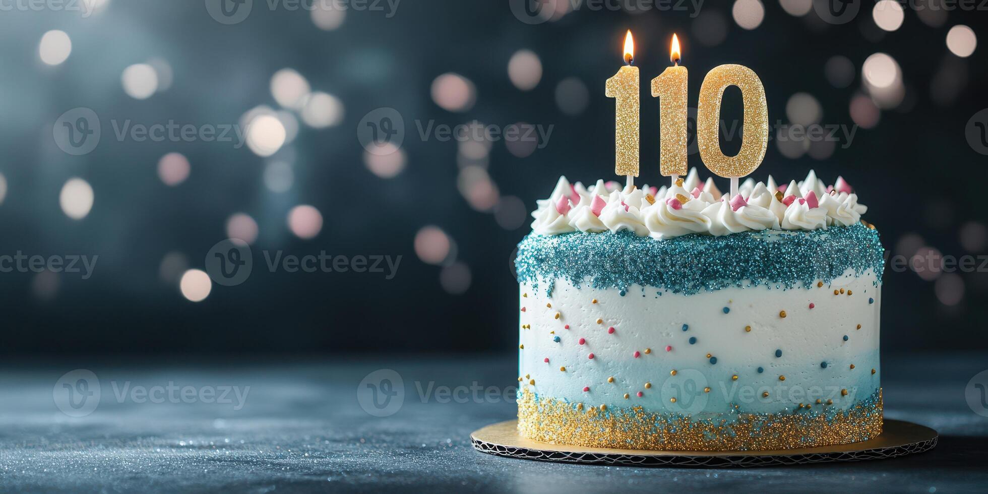 Celebratory cake adorned with sparkling candles marking a special 110th birthday occasion photo