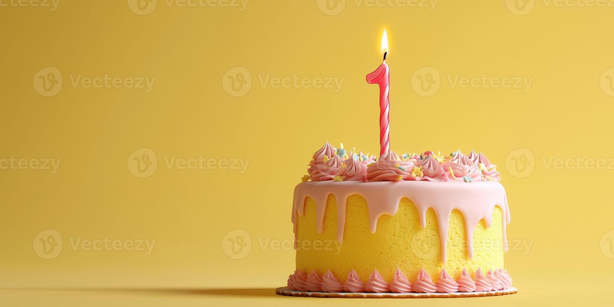 Celebratory yellow cake with pink frosting and a single candle for first birthday celebration photo