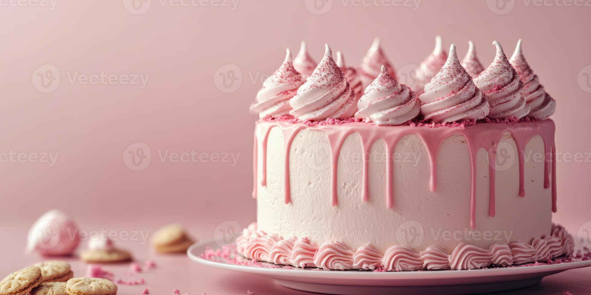 Deliciously decorated cake with pink frosting and meringue peaks on a pink background photo