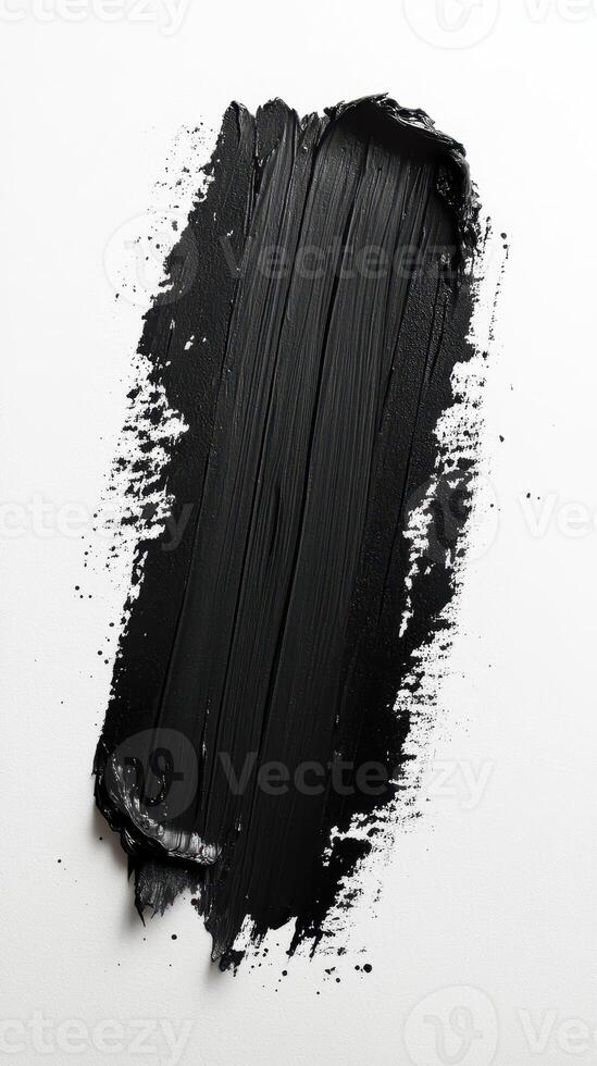 Black paint stroke on canvas creates a striking visual contrast with smooth texture and artistic appeal in a minimalistic composition photo