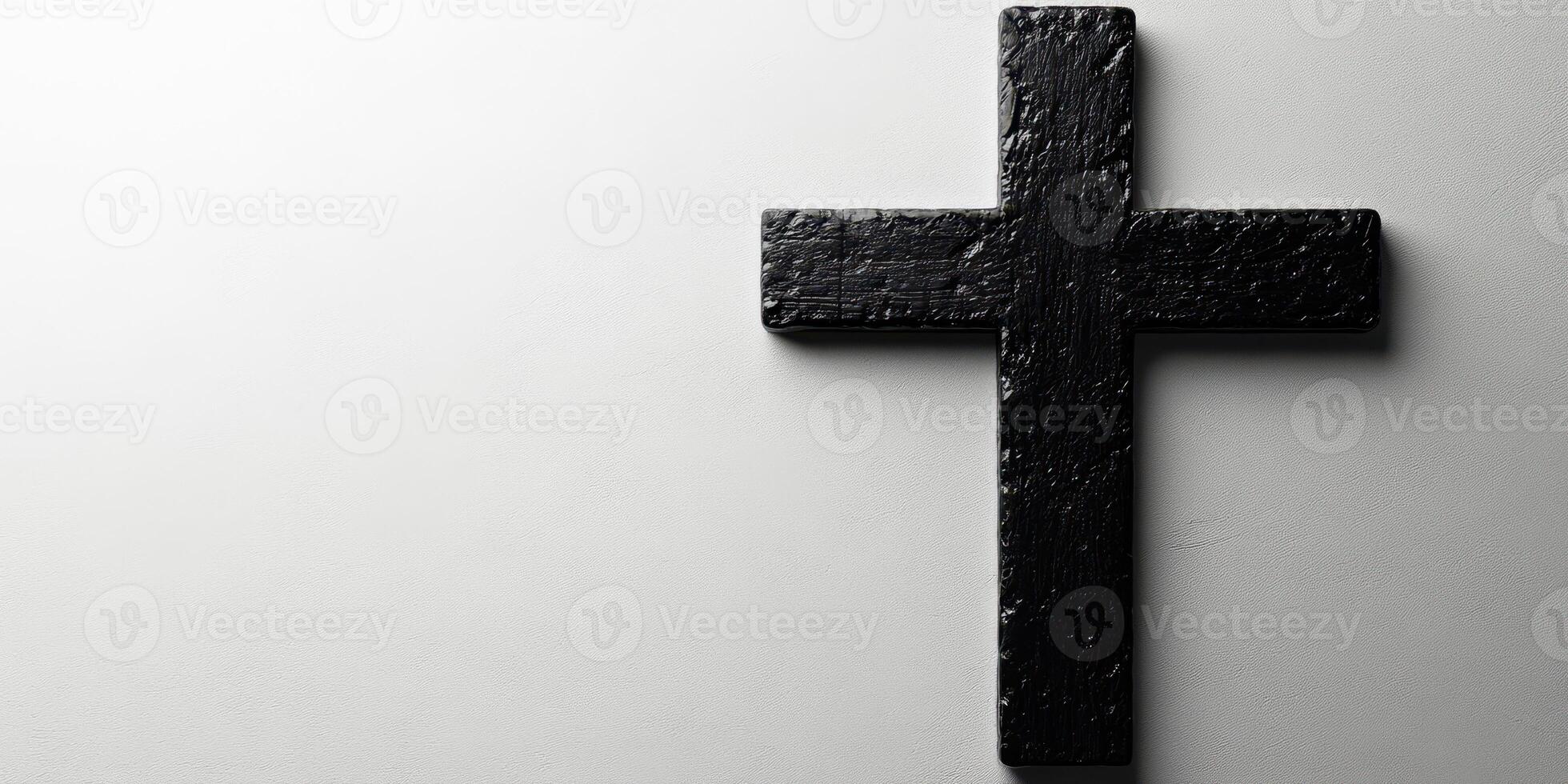 Black wooden cross displayed against a light background in a serene setting for reflection and meditation photo
