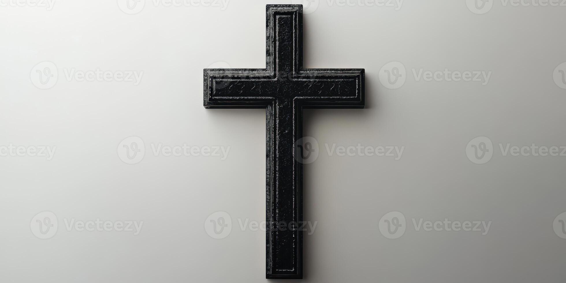 Black cross on a plain background, symbolizing faith, spirituality, and devotion in religious contexts photo