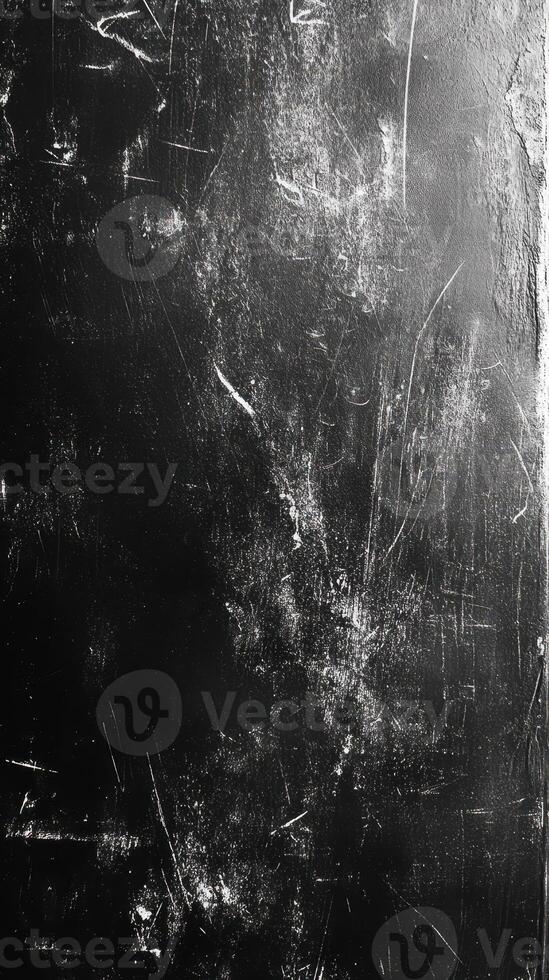 Textured black surface with scratches and marks showcasing wear and age in a minimalistic style photo